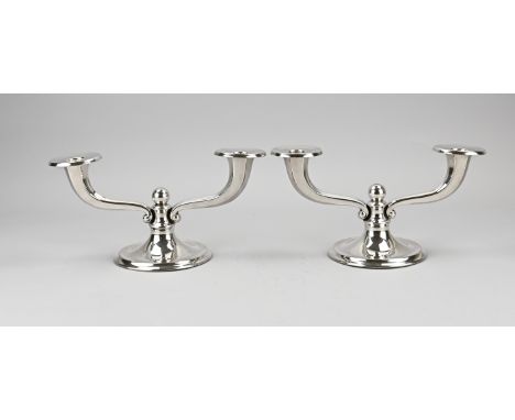 Two silver candlesticks, late Art Deco, 830/000, Candlestick on round base with 2 arms and a round knob in the middle. The li