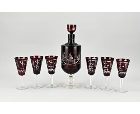 7-piece Bohemian crystal liqueur set. Ruby red. Facet cut. Size: 17 - 35 cm. In good condition.