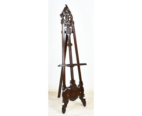 Large mahogany easel in rococo style. Second half 20th century. Size: 178 cm. In good condition.