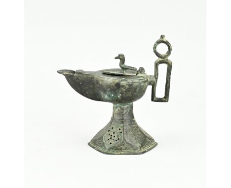 Early antique bronze oil lamp. Persia? Archaeological find. Cherogh with bird. 12th - 13th century. Hinge defective. Size: 13