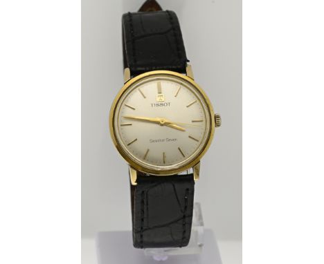 Tissot watch, unisex, goldplated, with a round case and a cream-coloured dial. Tissot seastar seven. Mechanical. ø case 32 mm