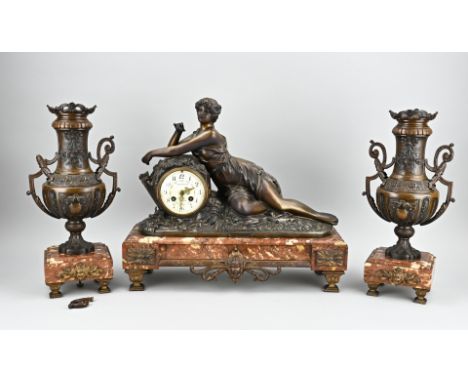 Three-piece antique French clock set of marble with composition metal. Circa 1890. Eight-day movement, half-hourly striking. 
