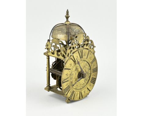 Small 18th century bronze lantern clock with verge escapement. One leg broken off, bell broken. Not tested. Dimensions: 22 x 