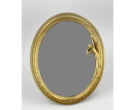 Brass Art Nouveau style mirror, with woman and floral decoration. Second half 20th century. Dimensions: 34 x 29 cm. In good c