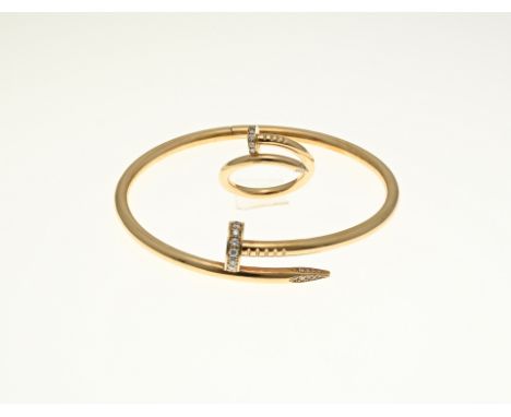 Yellow gold bangle and ring, 750/000, model nail with diamonds. Bangle provided with a box clasp with hinge. The head is deco