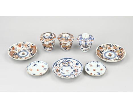 Three antique 3-piece Imari porcelain cup + saucer + lid, also two loose saucers. Two saucers hairlines. One saucer chip. Two