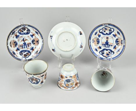 Three Chinese Imari porcelain chocolate cups + saucers. 18th century. Three saucers good. One cup good. One cup chip. One cup
