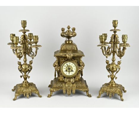 Three-part antique French bronze clock set with gilding. Neo-renaissance. Circa 1890. Eight-day movement, half-hourly strikin