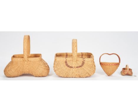 Grouping of four (4) contemporary Southern split oak baskets. Includes one (1) horseback market basket with elongated handle 
