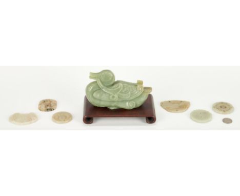 Seven (7) carved Chinese jade items, including duck figure and plaques. 1st item: Celadon jade recumbent duck figure. Illegib