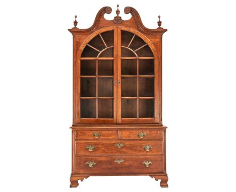 Southern two-piece Chippendale press or bookcase, walnut primary, yellow pine secondary. Upper case with carved broken arched