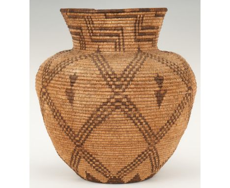 Large Native American Apache coiled basket, olla form, with contrasting step, lattice, arrowhead and floral designs. 20th cen