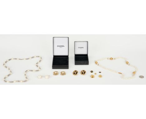 Twelve (12) Chanel designer costume jewelry items, including one (1) faux pearl necklace, three (3) pairs of clip on earrings
