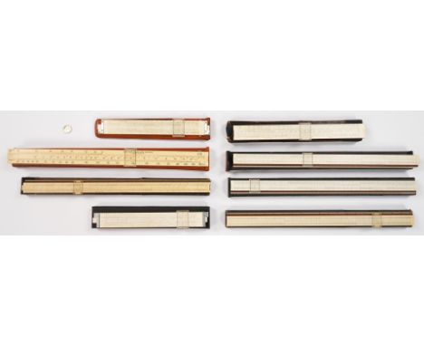 Eight (8) Keuffel &amp; Esser linear slide rulers, including two (2) made specially for the U.S. Military. 1st item: 4110 Pow