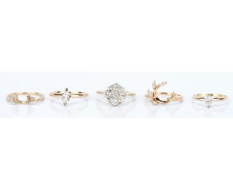 Lot of 14K yellow gold rings, two (2) sets of two (2) and one (1) single, 5 total items. 1st set: Two (2) 14K yellow gold rin