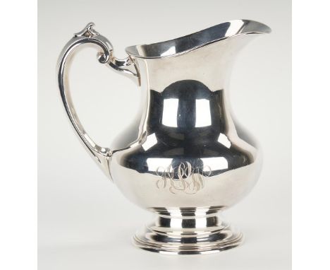 Reed &amp; Barton sterling silver water pitcher, pear shaped with C scroll handle, monogram kLw to side; stamped mark to unde