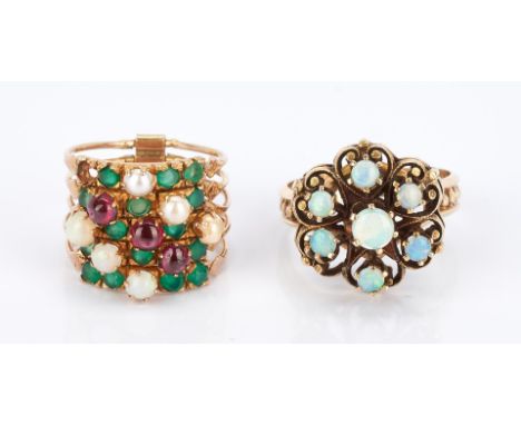 2 Ladies 14K Rings. 1st item: Ladies 14K yellow gold ring with 6 natural cabochon opals ranging from 3.1 to 4.9mm. The ring i