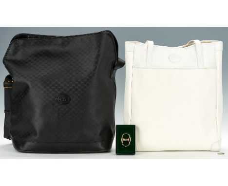 Three (3) Gucci items, including two (2) coated canvas tote bags and one (1) belt buckle. 1st item: White&nbsp;monogram coate