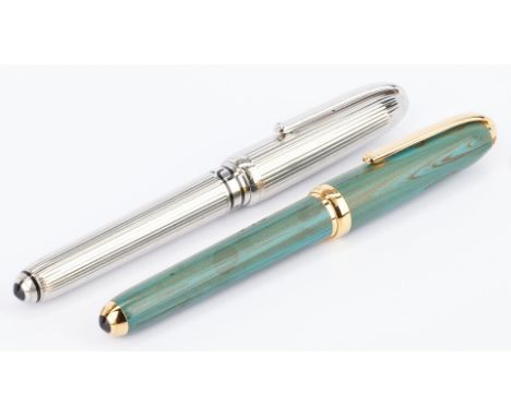 Two (2) Limited Edition Louis Cartier fountain pens, including 150th Anniversary and Dandy Ebonite Vert, both with two tone 1