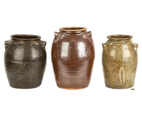 Grouping of three (3) Western North Carolina alkaline glazed pottery jars, all with applied lug handles including one (1) wit