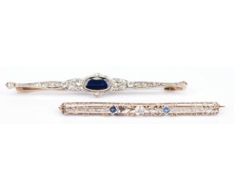 1st item: Ladies 18K yellow gold brooch featuring 1 oval brilliant natural sapphire approximately 10.4 x 5.3mm, heat treated,