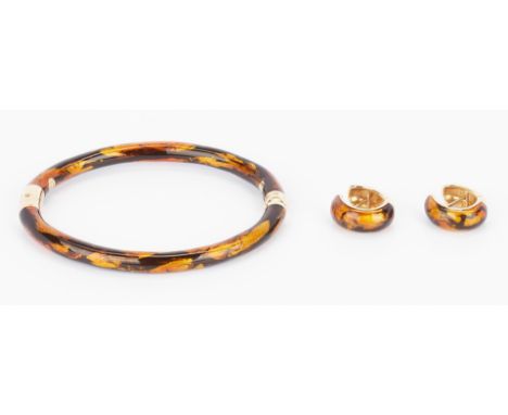 1st item: Ladies Soho bangle bracelet with 18K yellow gold and enamel. The bracelet is marked "18K", "Italy", and "Soho". The