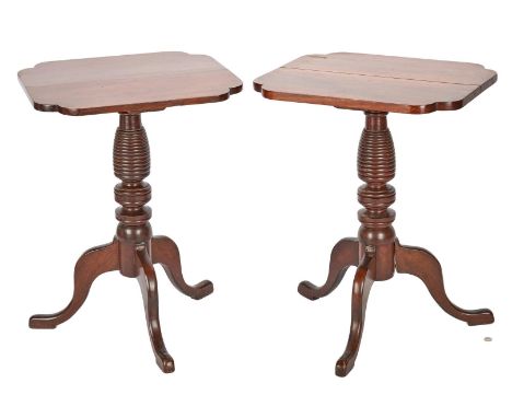 Pair of walnut candlestands, rectangular tops with shaped corners, over ring turned and "beehive" shaped pedestals, each havi