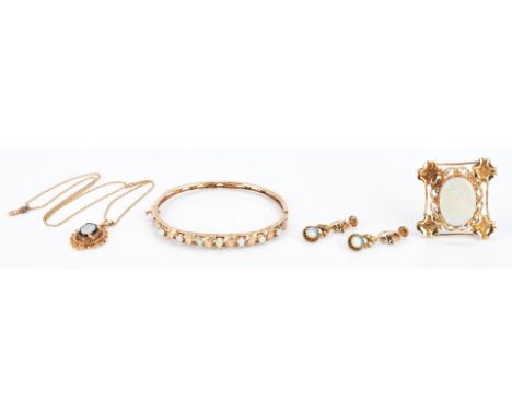 Set includes 1 necklace with pendant, 1 bangle bracelet, 1 brooch/pendant, and 1 pair of earrings. 1st item: Ladies 14K chain
