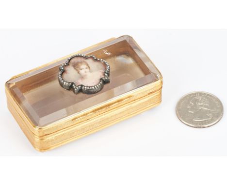 Ladies Continental snuff or pill box comprised of 2 step cut clear quartz rectangular pieces forming the top and base with 14