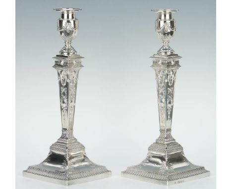 Pair of English Neoclassical style sterling weighted candlesticks, hallmarked JSH for Joseph &amp; Horace Savory, London, Eng