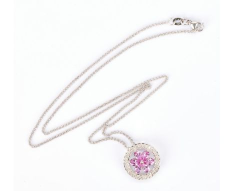 One (1) ladies 18K diamond and sapphire pendant together with one (1) ladies 14K necklace. 1st item: Ladies 5/8" round 18k wh