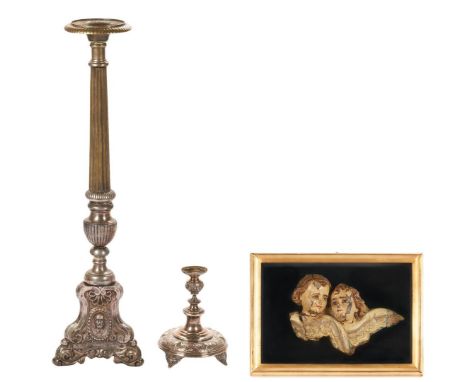 Three (3) 19th century religious items, including two (2) silverplated altar candlesticks and one (1) cherub relief carving. 