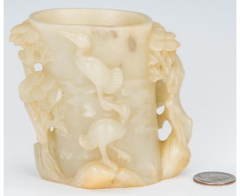 Chinese carved light celadon jade brush pot with relief and reticulated crane and pine tree decoration. 3 3/4" H x 3 3/4" dia
