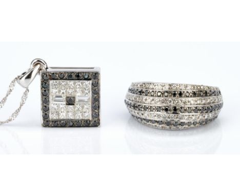 Grouping of two (2) pieces of ladies jewelry with black diamonds. 1st item: One ladies 14k white gold 1.25mm twisted diamond 