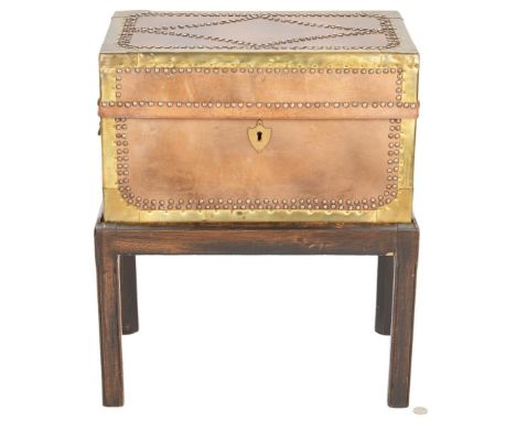 Leather or hide covered walnut document box with hinged cover, brass bound edges and decorative brass tack ornamentation, shi