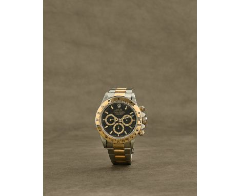 Rolex. Chronographe bracelet en or jaune 18K (750) et acier mouvement automatiqueRolex. A stainless steel and gold automatic 