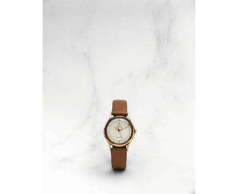 Omega. Montre bracelet en or jaune 18K (750) mouvement automatique 'bumper'Omega. An 18K gold bumper automatic wristwatch Mod