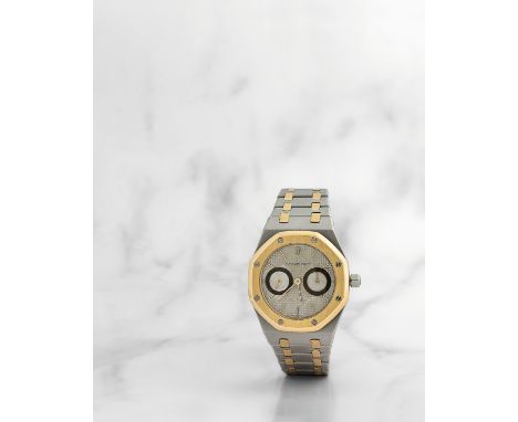 Audemars Piguet. Montre bracelet en or jaune 18K (750) et acier avec date mouvement automatiqueAudemars Piguet. A stainless s