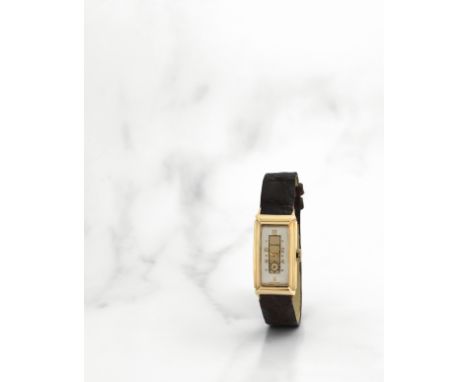 Longines. Montre bracelet en or jaune 14K (585) de forme rectangulaire mouvement mécaniqueLongines. A 14K gold manual wind re