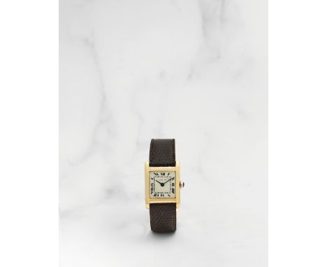 Cartier. Montre bracelet en or jaune 18K (750) de forme rectangulaire mouvement mécaniqueCartier. An 18K gold manual wind rec