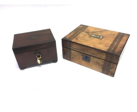 A VICTORIAN WALNUT SEWING BOX  with fitted interior, 30cm wide 22cm deep 13cm high;  and a mahogany twin division caddy 21cm 