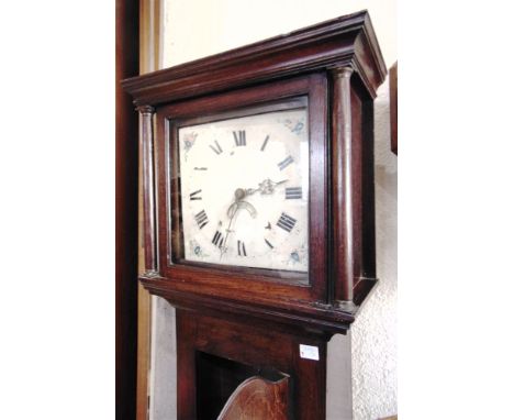 A PROVINCIAL OAK CASED 30-HOUR LONGCASE CLOCK  the enamel dial with floral painted decoration to the spandrels and date apert