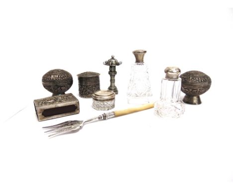 A CHINESE EXPORT PEPPERETTE unmarked; three Eastern metalware boxes; a matchbox holder; three silver topped glass toilet bott