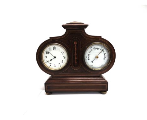 AN EDWARDIAN CLOCK/BAROMETER  in an ornate inlaid mahogany case raised on four brass bun supports, height 25cm width 27cm