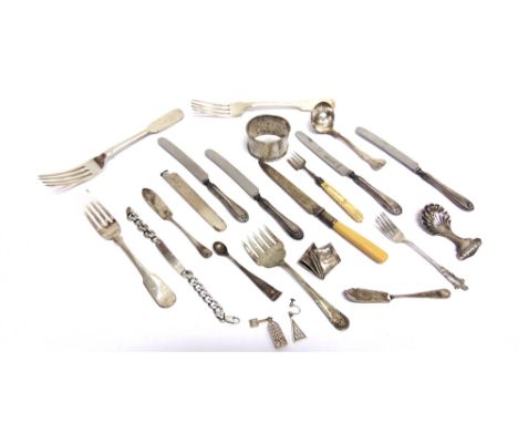 A COLLECTION OF FLATWARE  comprising; three antique silver fiddle pattern forks; a sifting spoon; a caddy spoon; two butter k