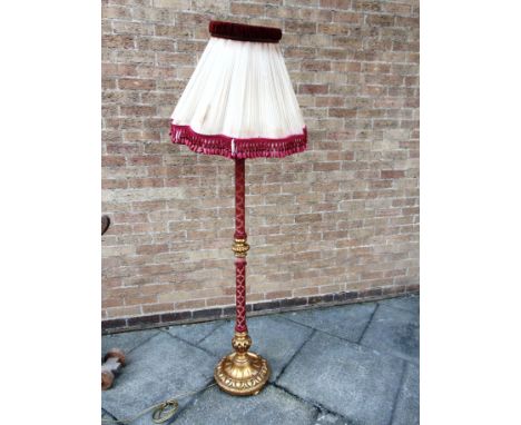 A FLOOR LAMP  the column and base part gilt painted and part fabric covered, height 149cm