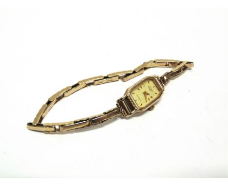 ROTARY, A LADY'S 9 CARAT GOLD QUARTZ WRIST WATCH  on a 9 carat gold expanding bracelet, 12.4g gross inclusive of the movement