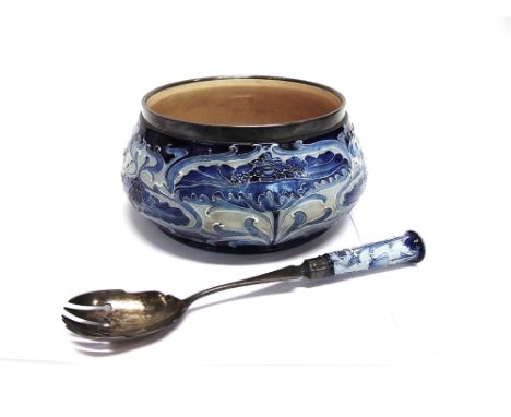 A MACINTYRE & CO. 'FLORIAN' WARE SALAD BOWL  with electroplated rim and allover blue tubelined decoration, signed to base 'WM