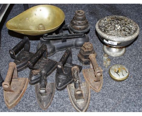 A counter balance weighing scale and weights; flat irons; plated rose bowl; brass pot and cover