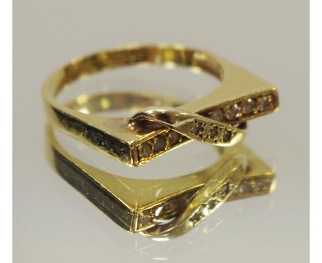 A continental yellow metal diamond ring, stamped 14k, 4.2g, gross